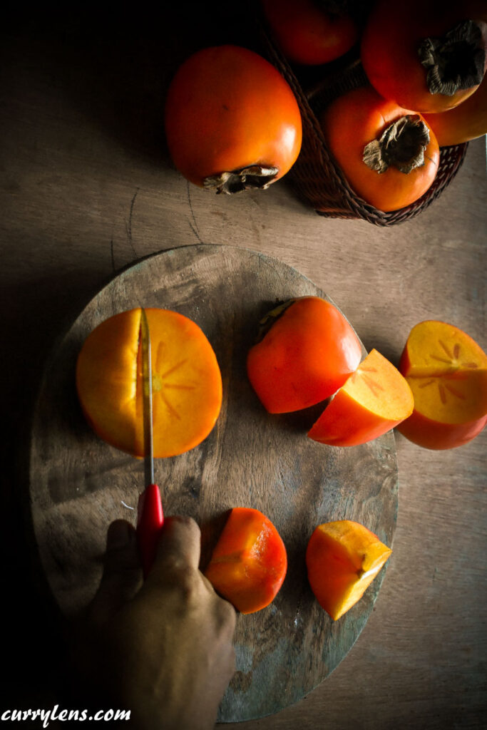 Cutting Riped Persimmons